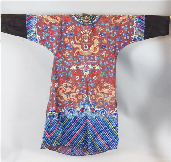 A Chinese claret satin embroidered silk and metal thread dragon robe, late Qing dynasty,